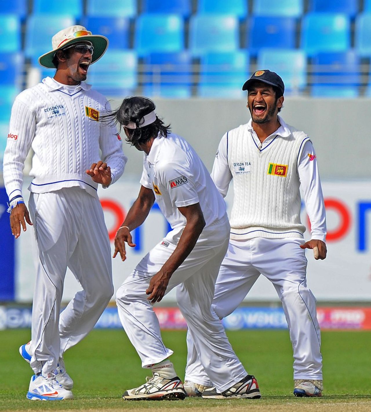 The Sri Lankans celebrate Khurram Manzoor's wicket, Pakistan v Sri Lanka, 2nd Test, Dubai, 3rd day, January 10, 2014