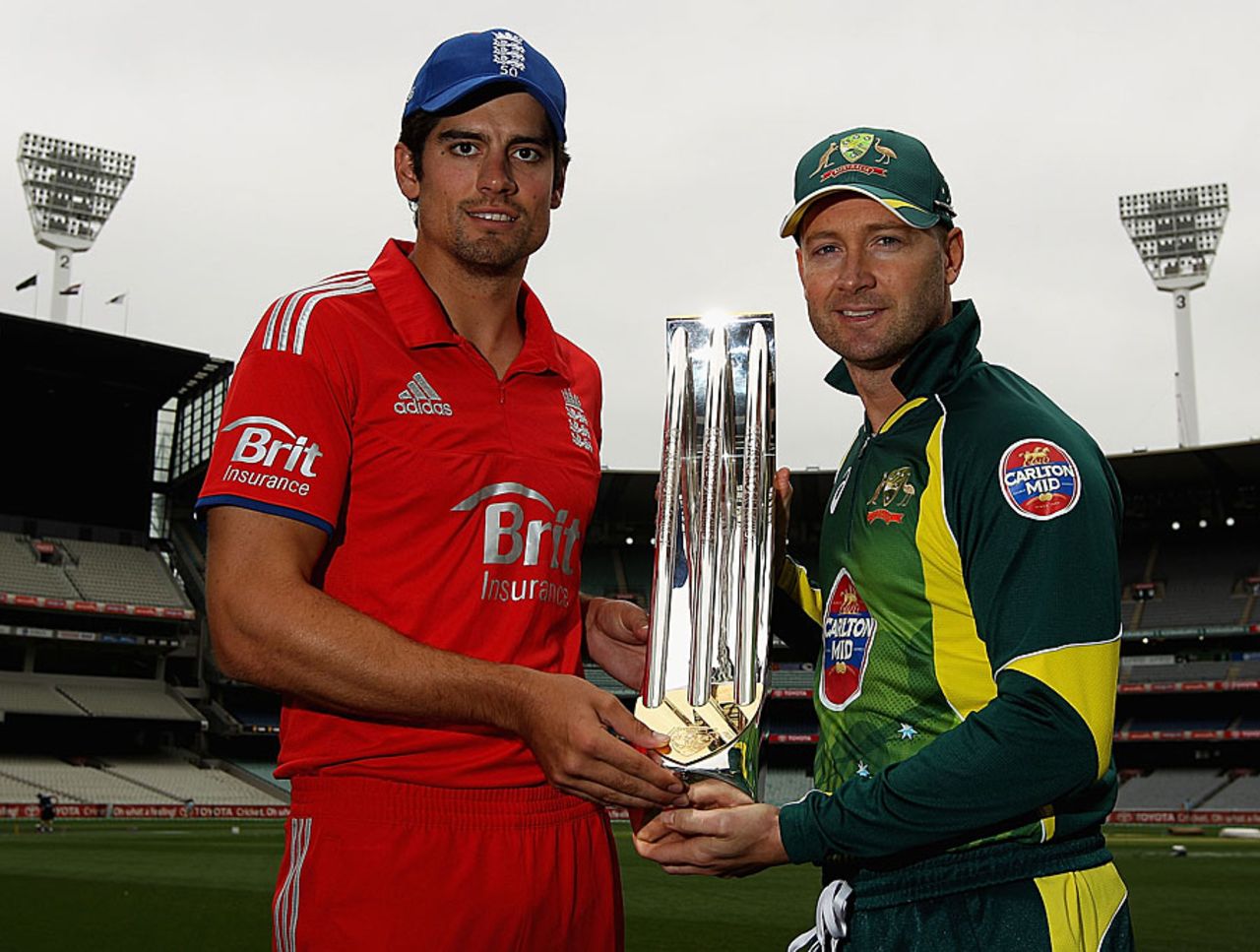 Alastair Cook and Michael Clarke pose with the ODI series trophy, Melbourne, January 11, 2014