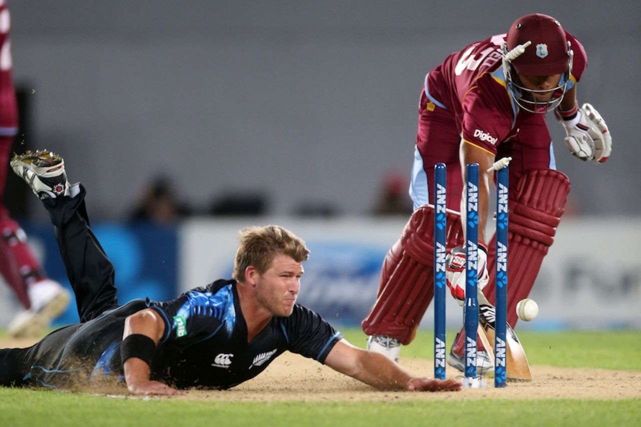 Corey Anderson attempts a run out, New Zealand v West Indies, 1st T20, Auckland, January 11, 2014