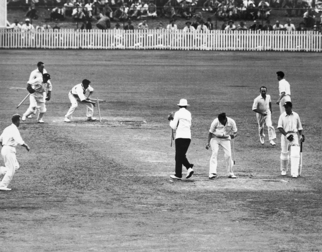 Australian players grab the stumps as souvenirs after beating England by 70 runs, Australia v England, 1st Test, Brisbane, 4th day December 5, 1950