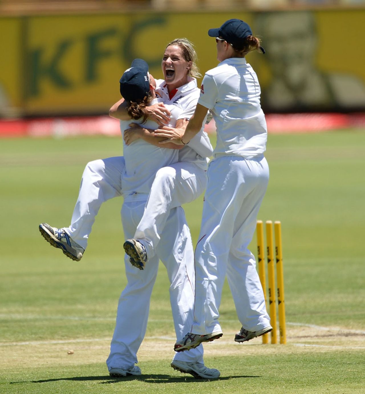 Katherine Brunt jumps on her team-mate after taking a wicket, Australia v England, Only women's Test, Perth, 4th day, January 13, 2014