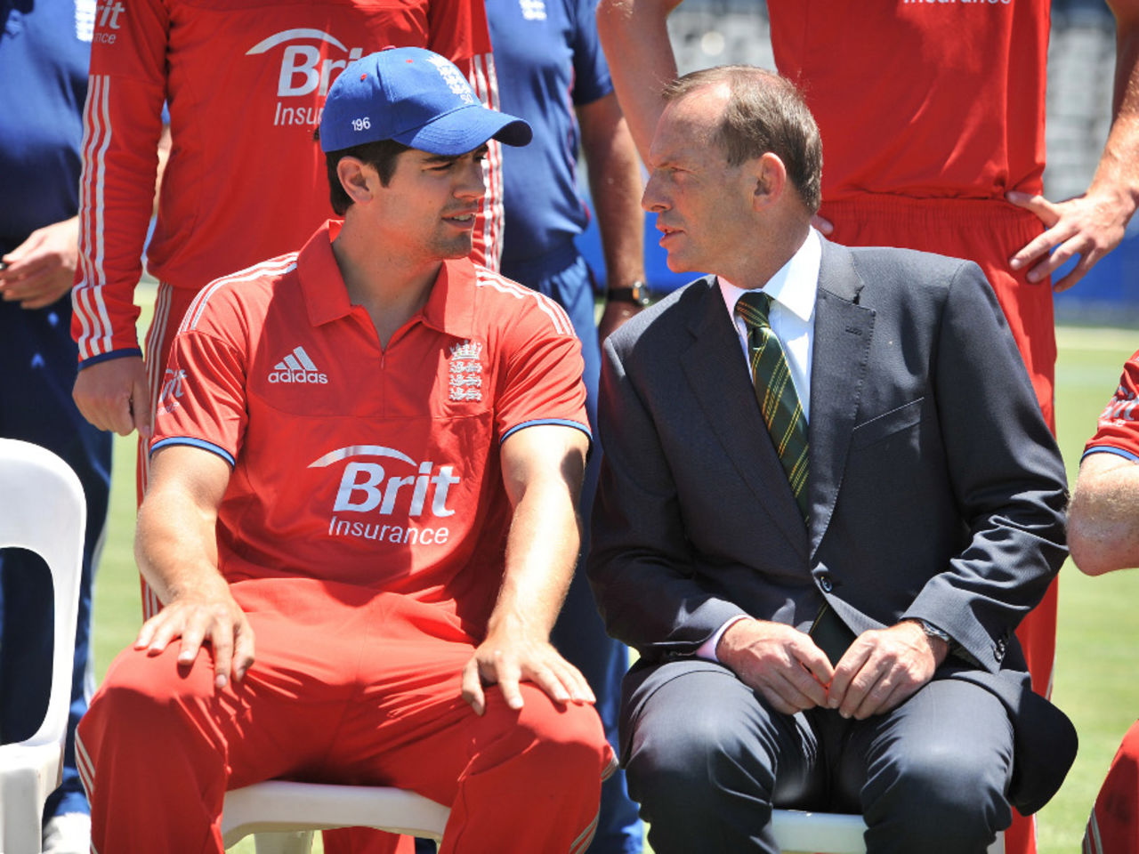 Want some advice, Alastair? Tony Abbott, the Australia PM, chats with the England captain, Prime Minister's XI v England XI, Tour match, Canberra, January 14, 2014
