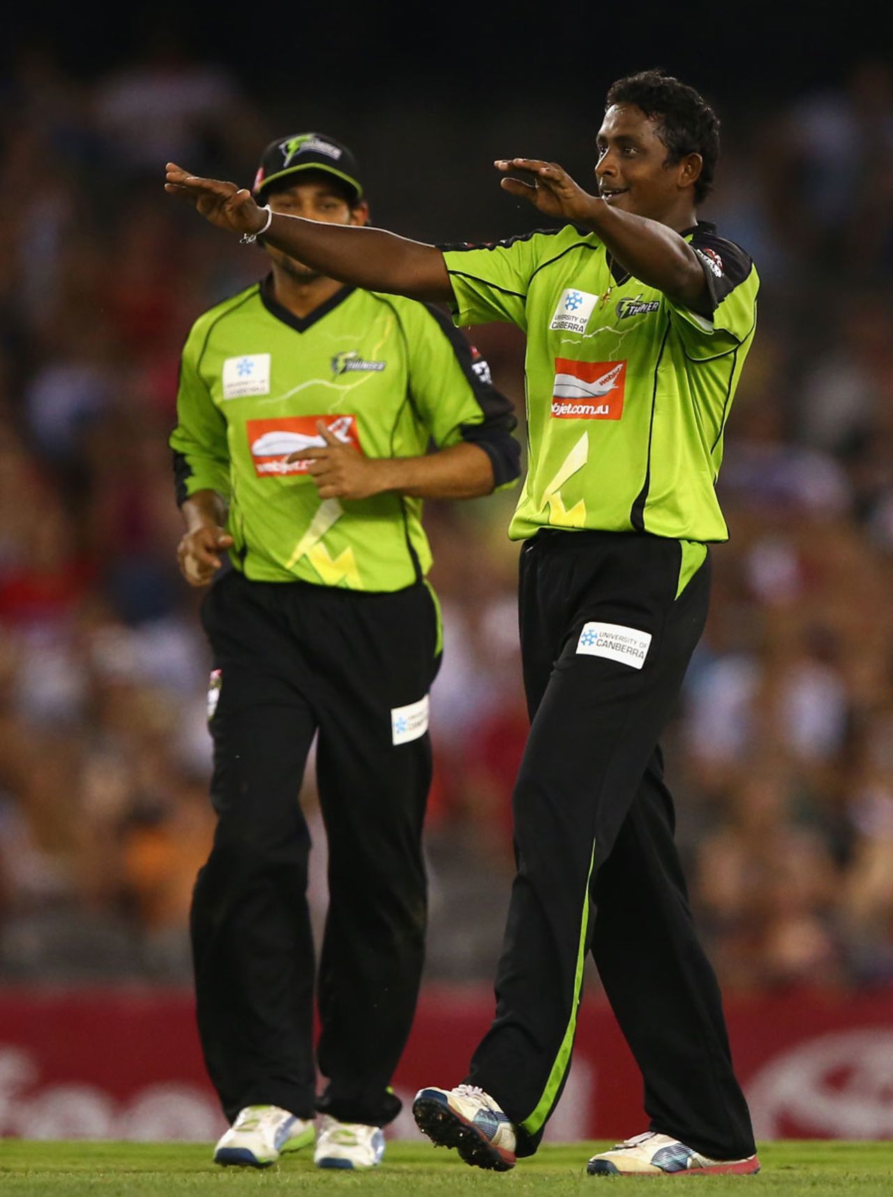 Ajantha Mendis celebrates a wicket, Melbourne Renegades v Sydney Thunder, Big Bash League, Melbourne, January 14, 2014