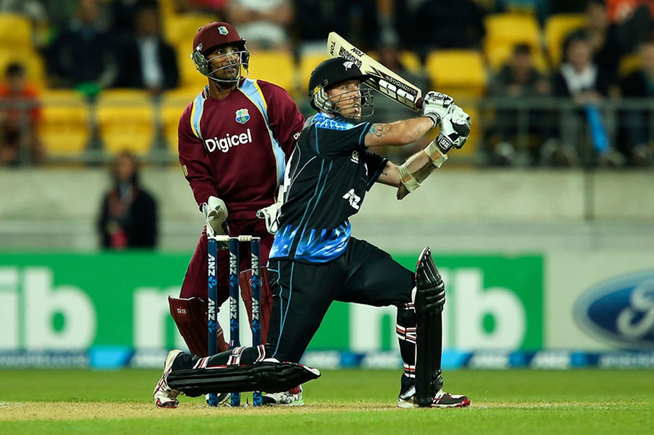 Luke Ronchi clears his front leg and swats the ball over the leg side, New Zealand v West Indies, 2nd T20, Wellington, January 15, 2014