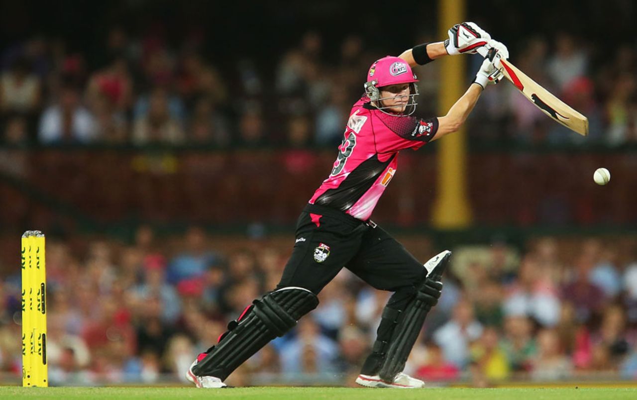 Steven Smith drives through the off side during his 52, Sixers v Hurricanes, Big Bash League 2013-14, Sydney, January 15, 2014