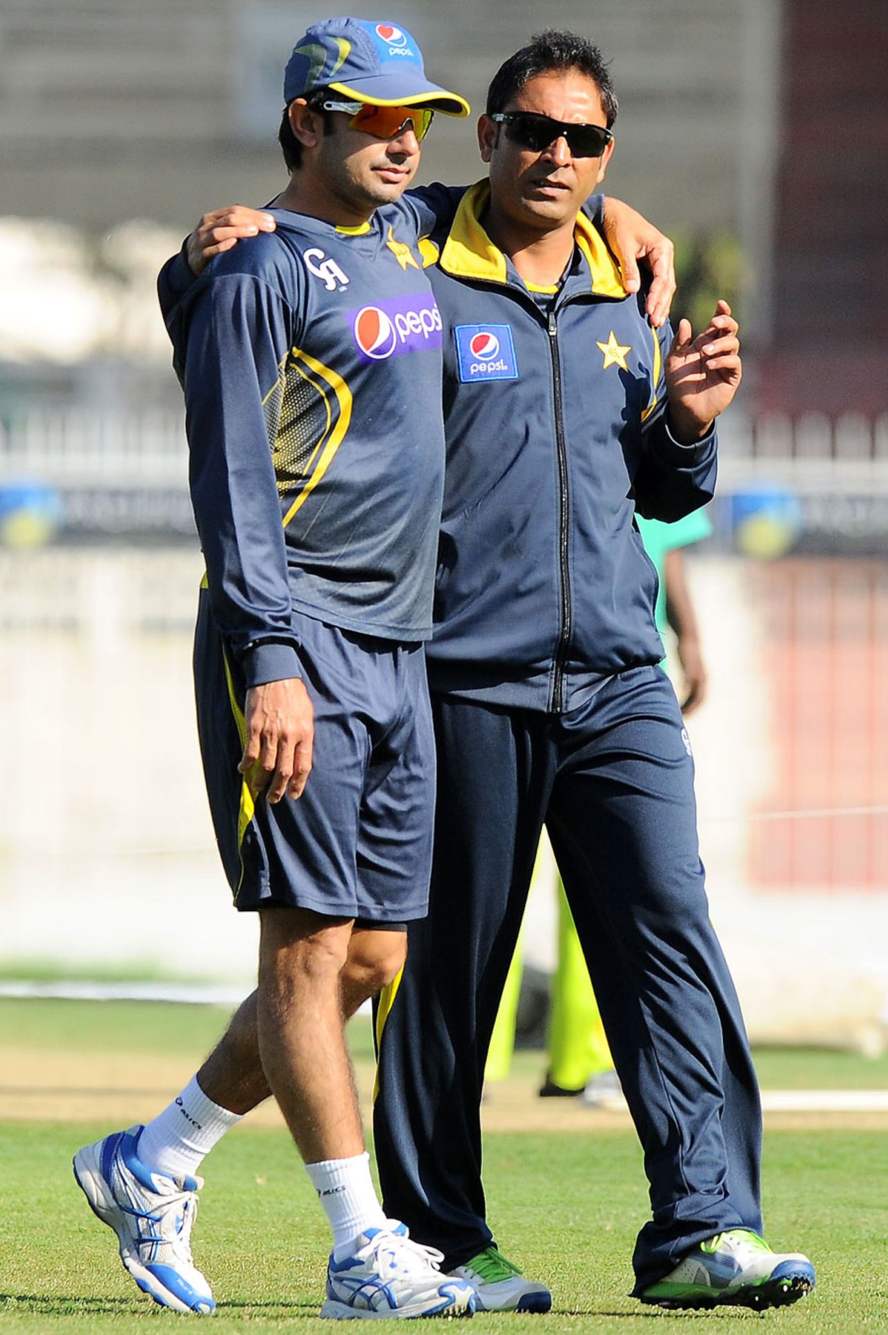 Saeed Ajmal and Abdur Rehman have a stroll at practice, Sharjah, January 15, 2014