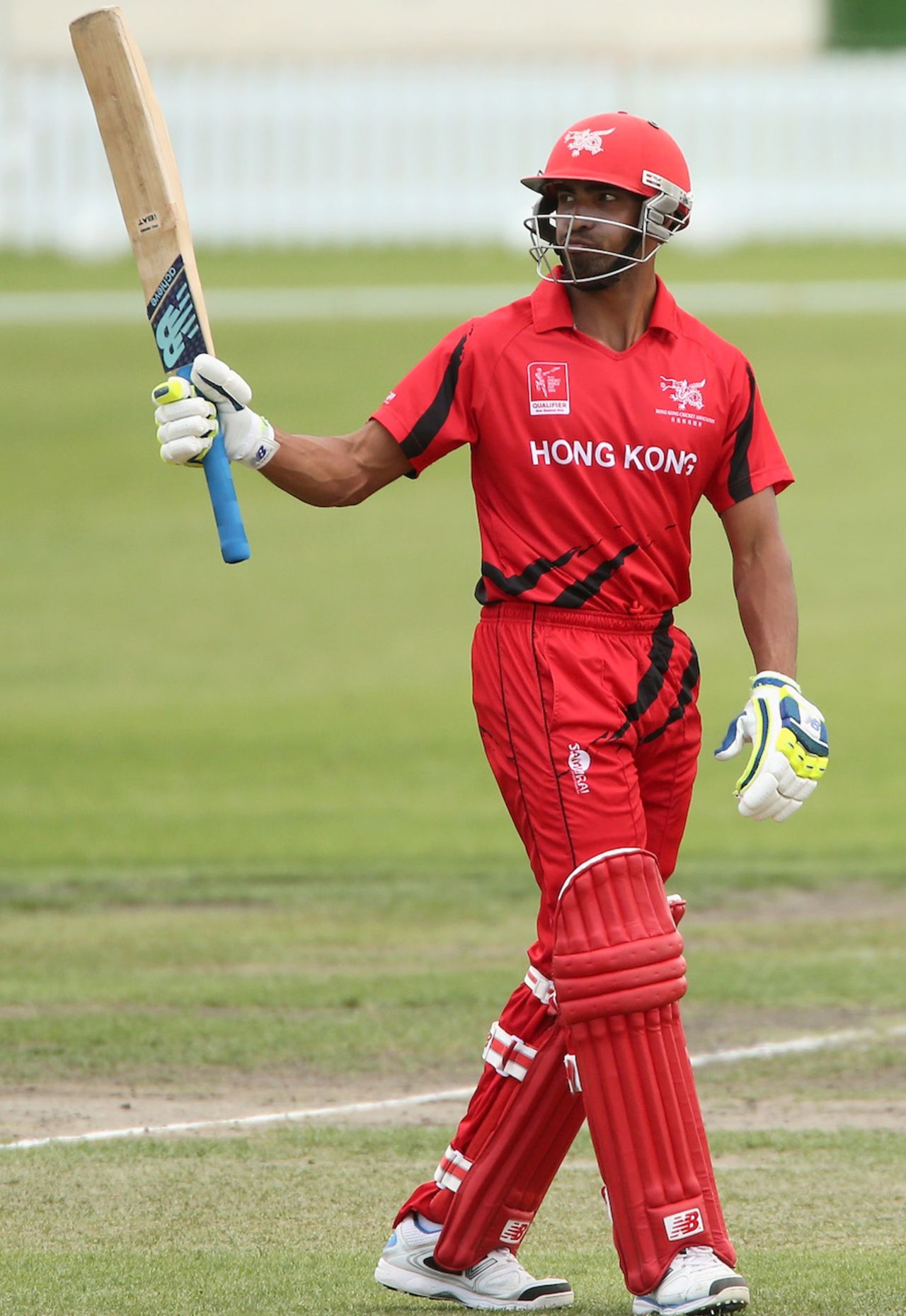 Irfan Ahmed raises his bat after reaching his fifty, Canada v Hong Kong, World Cup 2015 qualifiers, Rangiora, January 17, 2014