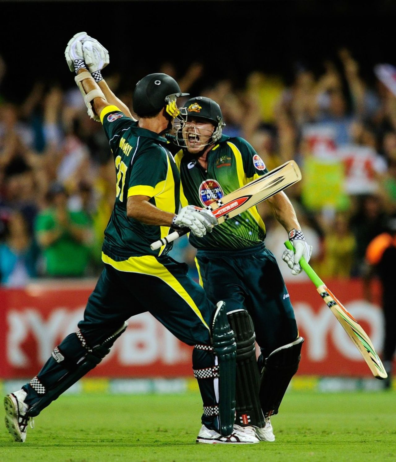 James Faulkner celebrates the win with Clint McKay, Australia v England, 2nd ODI, Gabba, January 17, 2014