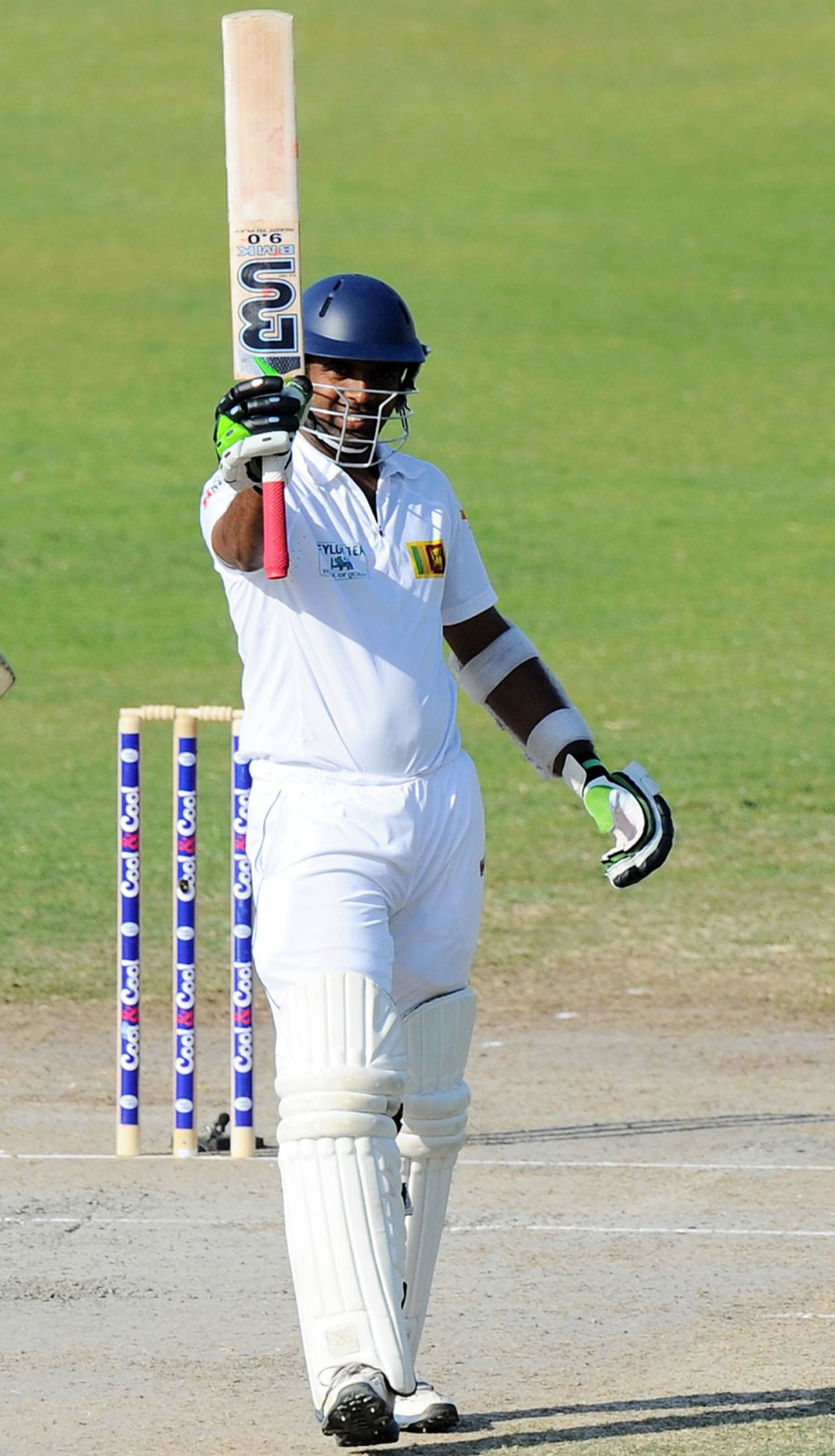 Dilruwan Perera raises his bat after scoring a maiden Test fifty, Pakistan v Sri Lanka, 3rd Test, Sharjah, 2nd day, January 17, 2014