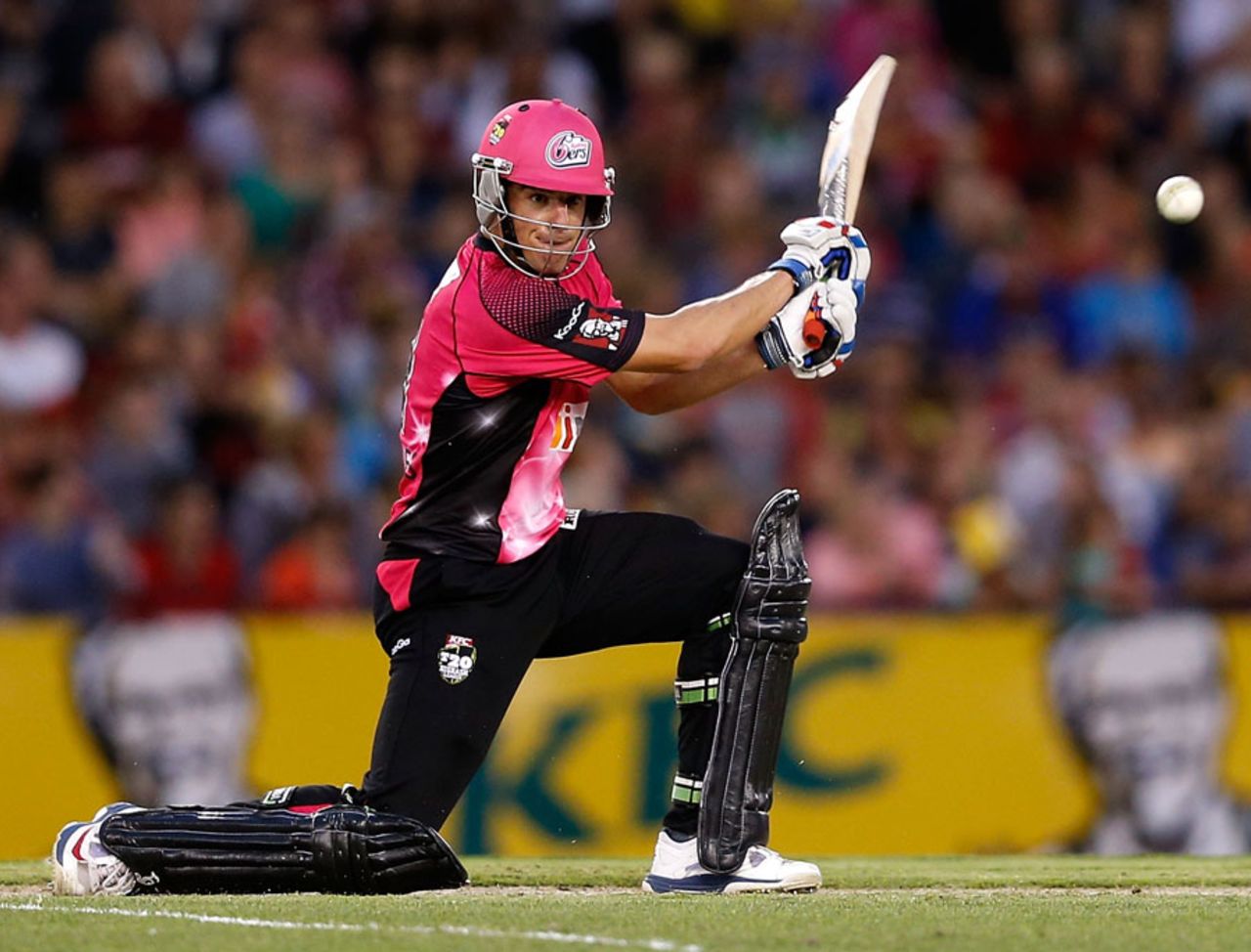 Moises Henriques muscles the ball through the off side during his 55, Renegades v Sixers, Big Bash League 2013-14, Melbourne, January 18, 2014