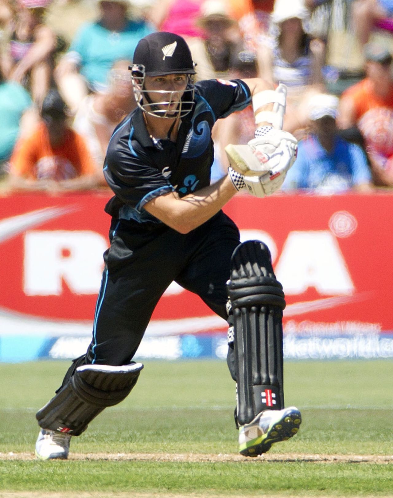 Kane Williamson steps out for a shot, New Zealand v India, 1st ODI, Napier, January 19, 2014