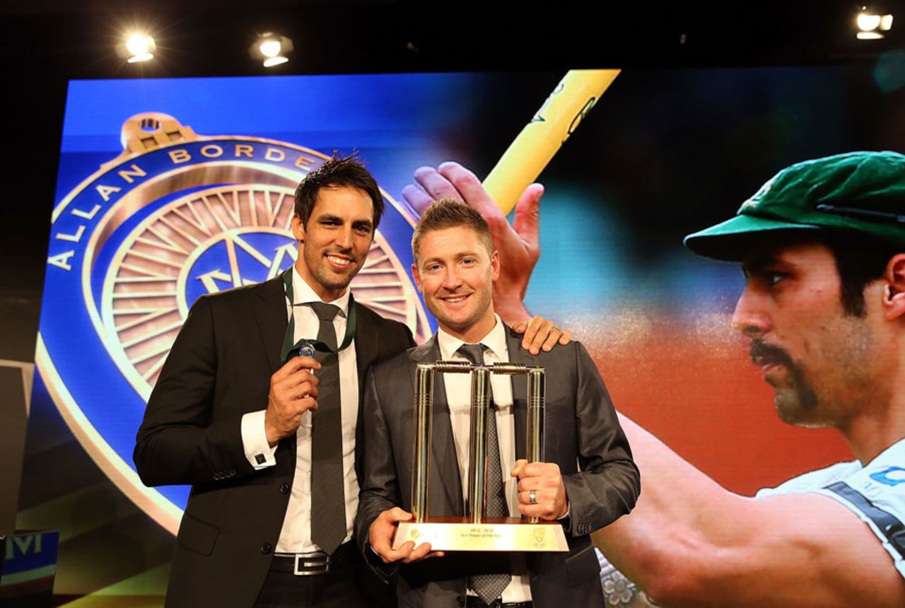 Mitchell Johnson and Michael Clarke pose with their respective awards, Sydney, January 20, 2014