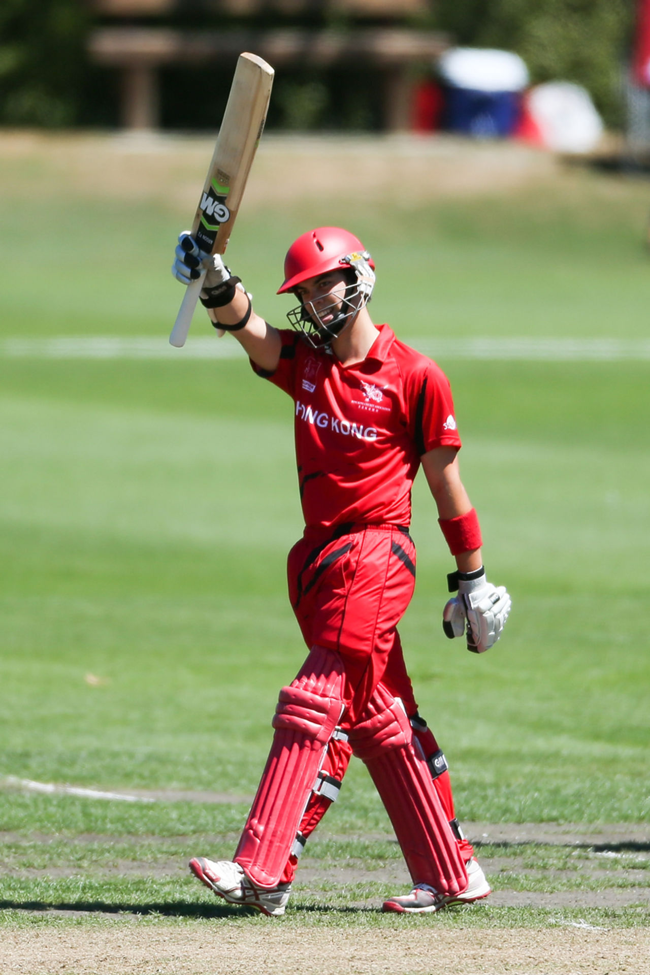 Mark Chapman acknowledges his half-century against Namibia in the Super Six match against Namibia at Rangiora Oval, New Zealand during the ICC Cricket World Cup Qualifier 2014