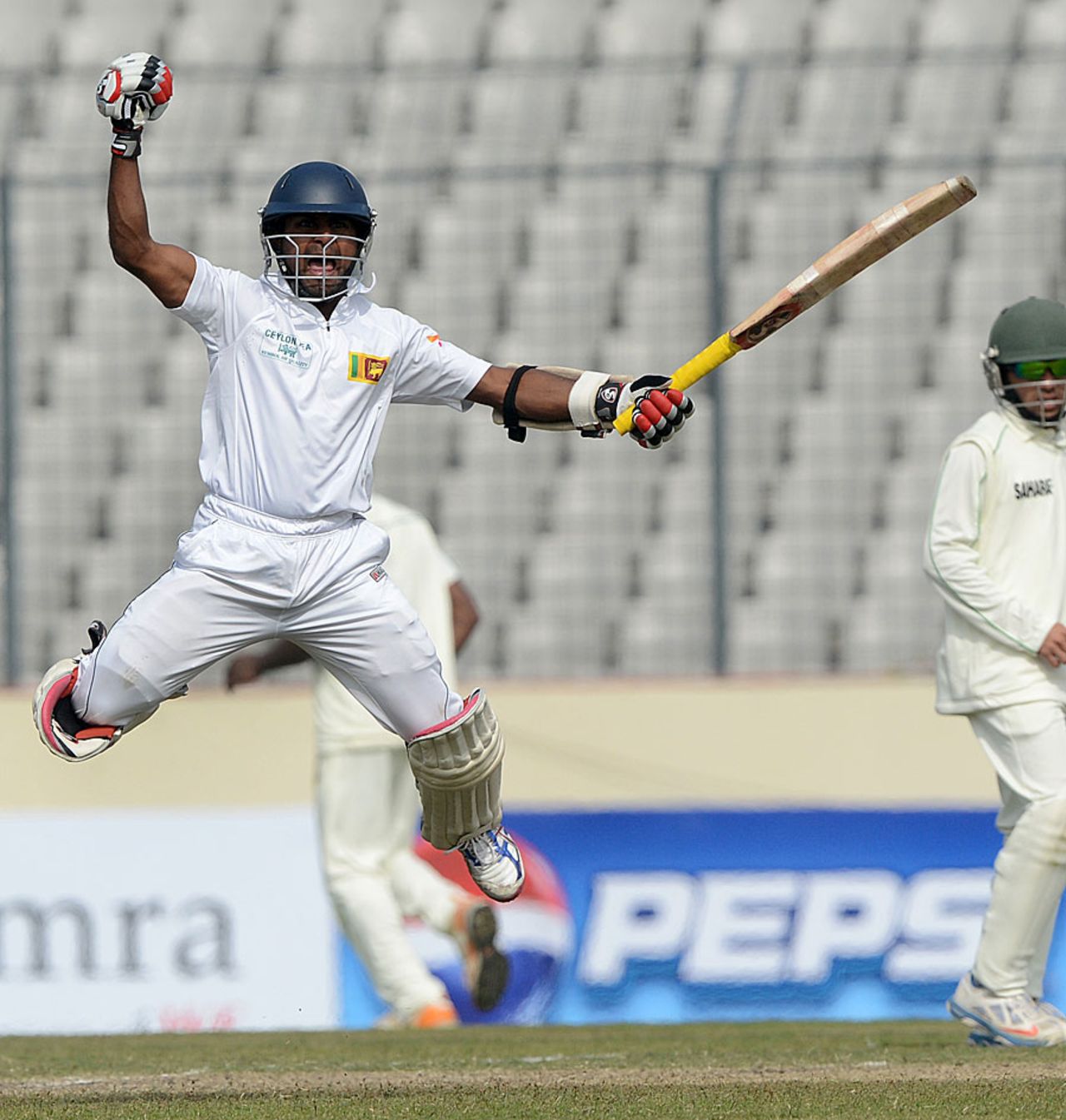 Kaushal Silva is ecstatic after reaching his century, Bangladesh v Sri Lanka, 1st Test, Mirpur, 2nd day, January 28, 2014