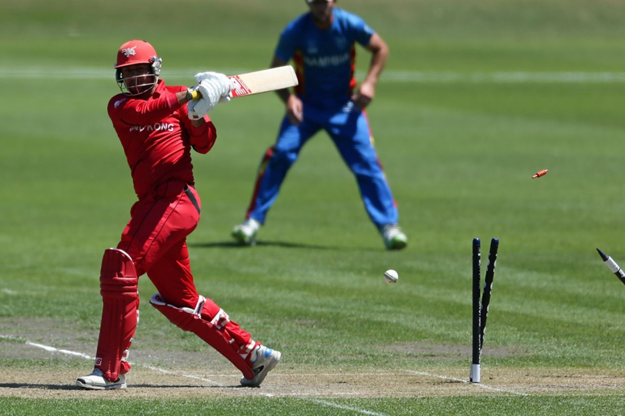 Babar Hayat of Hong Kong is bowled during the ICC Cricket World Cup Qualifier match between Namibia and Hong Kong at Mainpower Oval on January 28, 2014 in Rangiora, New Zealand. (Photo by Martin Hunter-IDI/IDI via Getty Images)