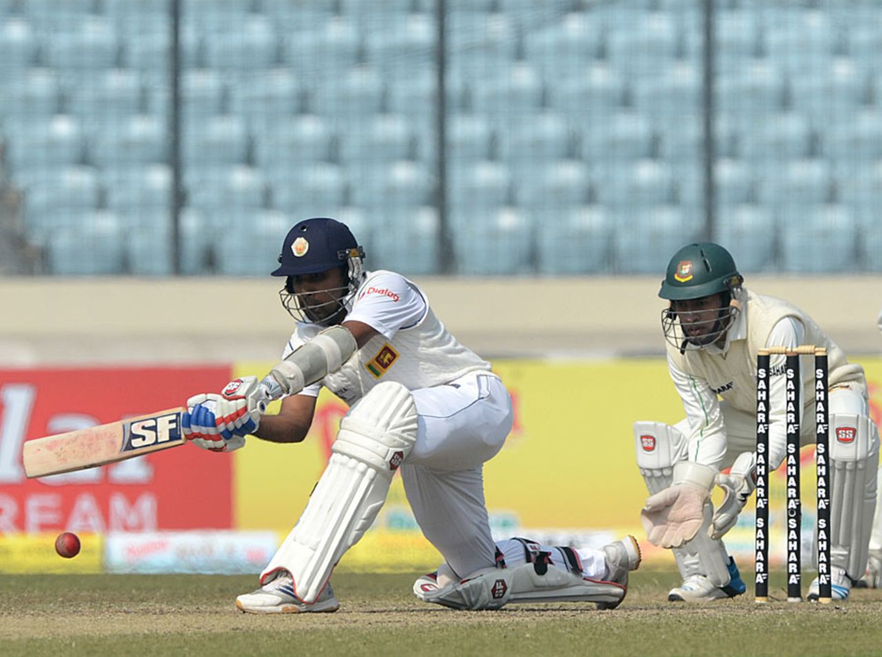 Mahela Jayawardene plays the sweep, Bangladesh v Sri Lanka, 1st Test, Mirpur, 3rd day, January 29, 2014