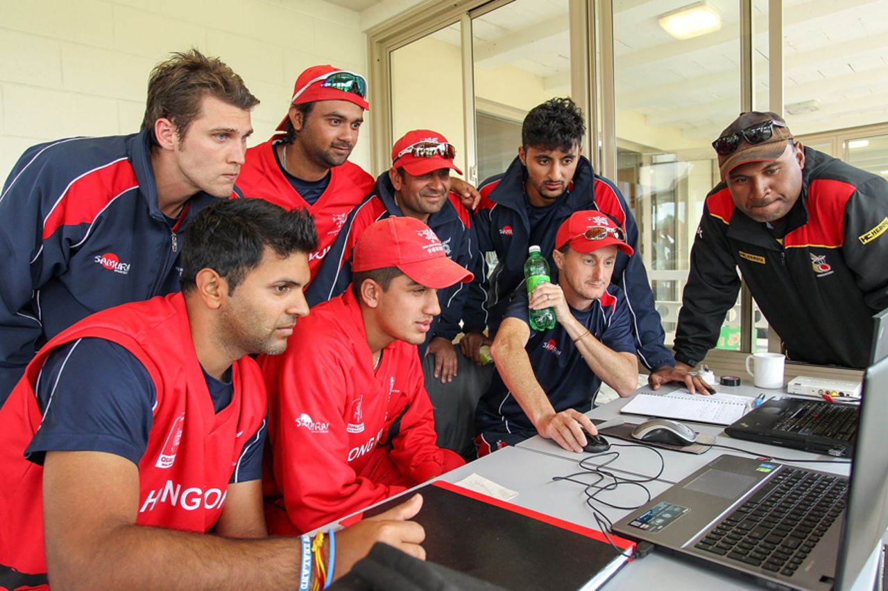 Hong Kong players follow conclusion of Scotland match online, Hong Kong v Papua New Guinea, ICC Cricket World Cup Qualifier, Bert Sutcliffe Oval, Lincoln, January 30, 2014