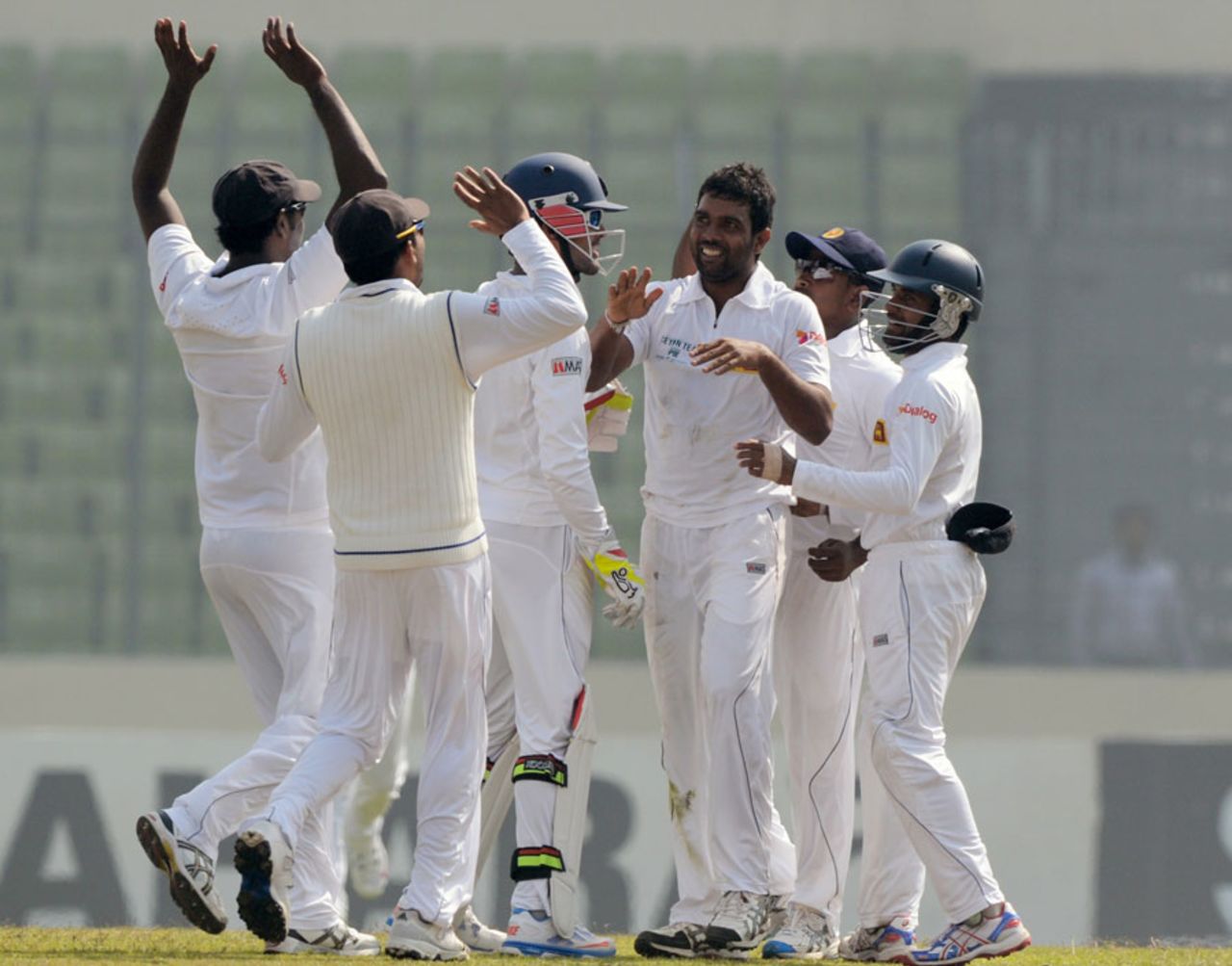 Dilruwan Perera is congratulated after a wicket, Bangladesh v Sri Lanka, 1st Test, Mirpur, 4th day, January 30, 2014