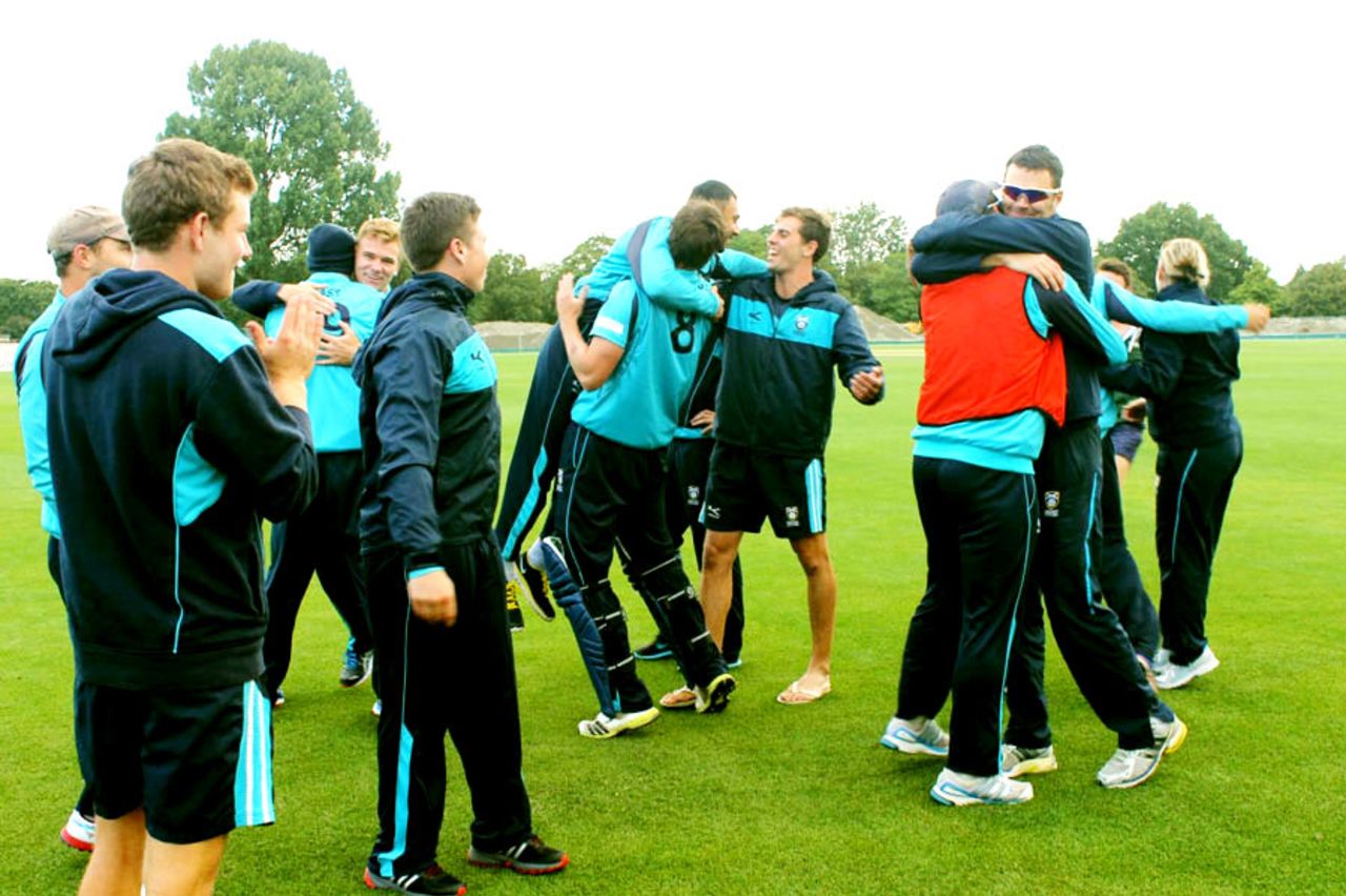 The Scotland players embrace after securing their berth in the 2015 World Cup, Kenya v Scotland, World Cup Qualifiers, Super Sixes, Christchurch, January 30, 2014