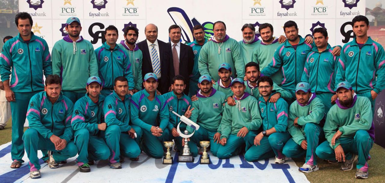 The victorious Rawalpindi team pose with the Quaid-e-Azam trophy, Islamabad v Rawalpindi, Quaid-e-Azam Trophy, final, Lahore, January 30, 2014