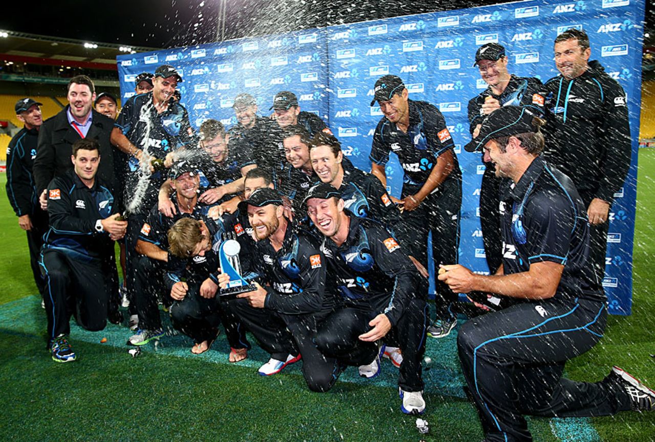 New Zealand players uncork the champagne and celebrate their 4-0 win, New Zealand v India, 5th ODI, Wellington, January 31, 2014