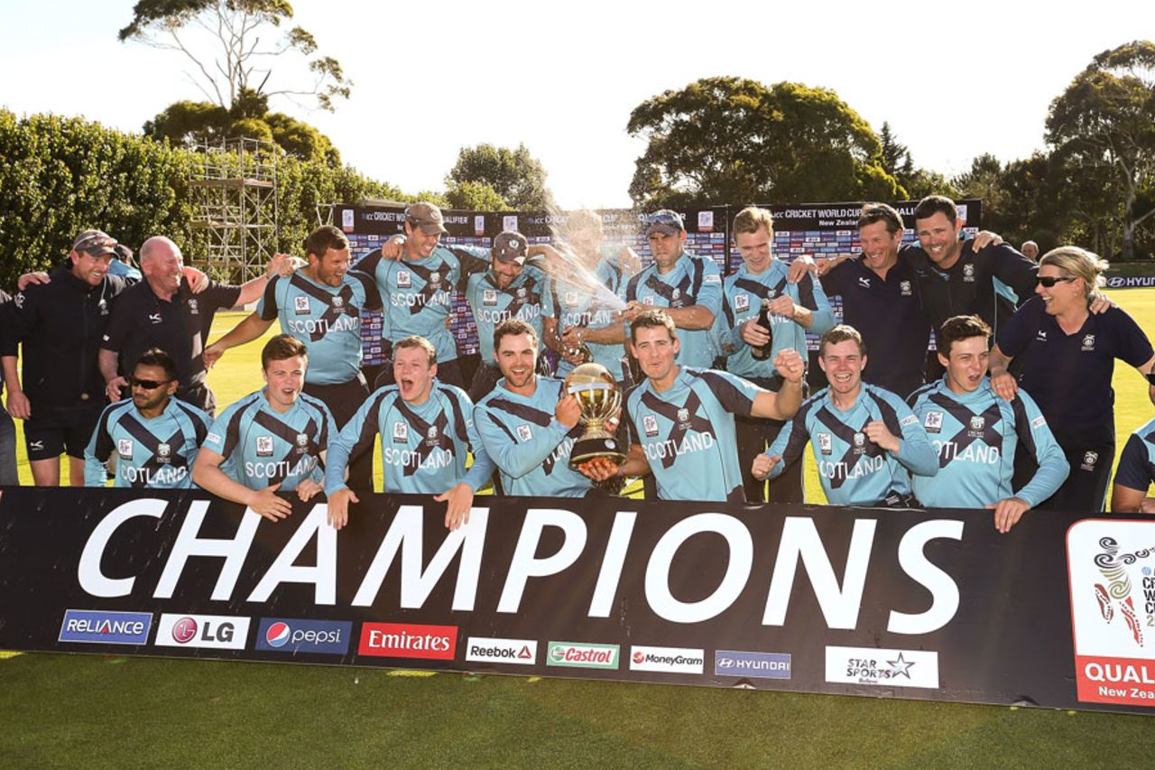 The victorious Scotland team with the World Cup Qualifier trophy, Cricket World Cup Qualifier, final, Lincoln, February 1, 2014