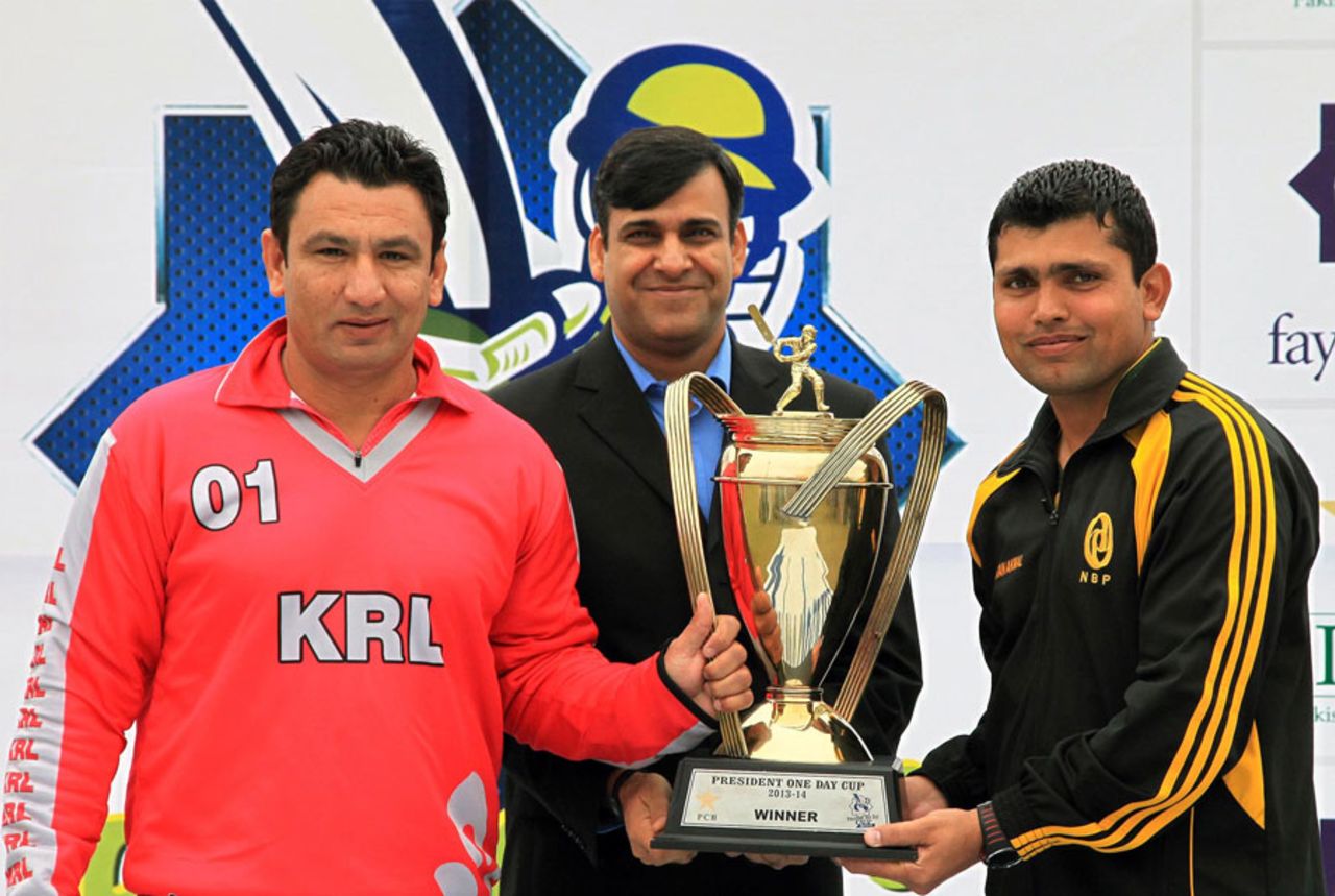KRL captain Saeed Anwar jnr, PCB CEO Subhan Ahmed and Kamran Akmal with the President's Cup Trophy, Khan Research Laboratories v National Bank of Pakistan, one-day final, Lahore, February 1, 2014