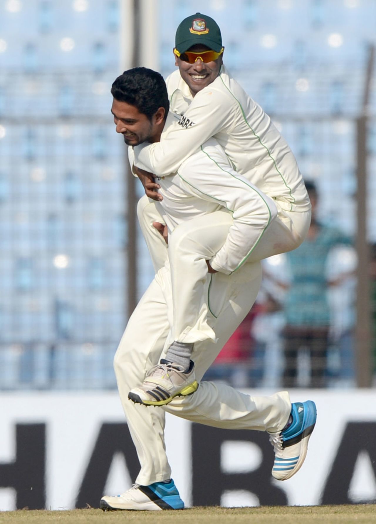 Sohag Gazi jumps on Mahmudullah's back after a Sri Lankan wicket, Bangladesh v Sri Lanka, 2nd Test, Chittagong, 1st day, February 4, 2014