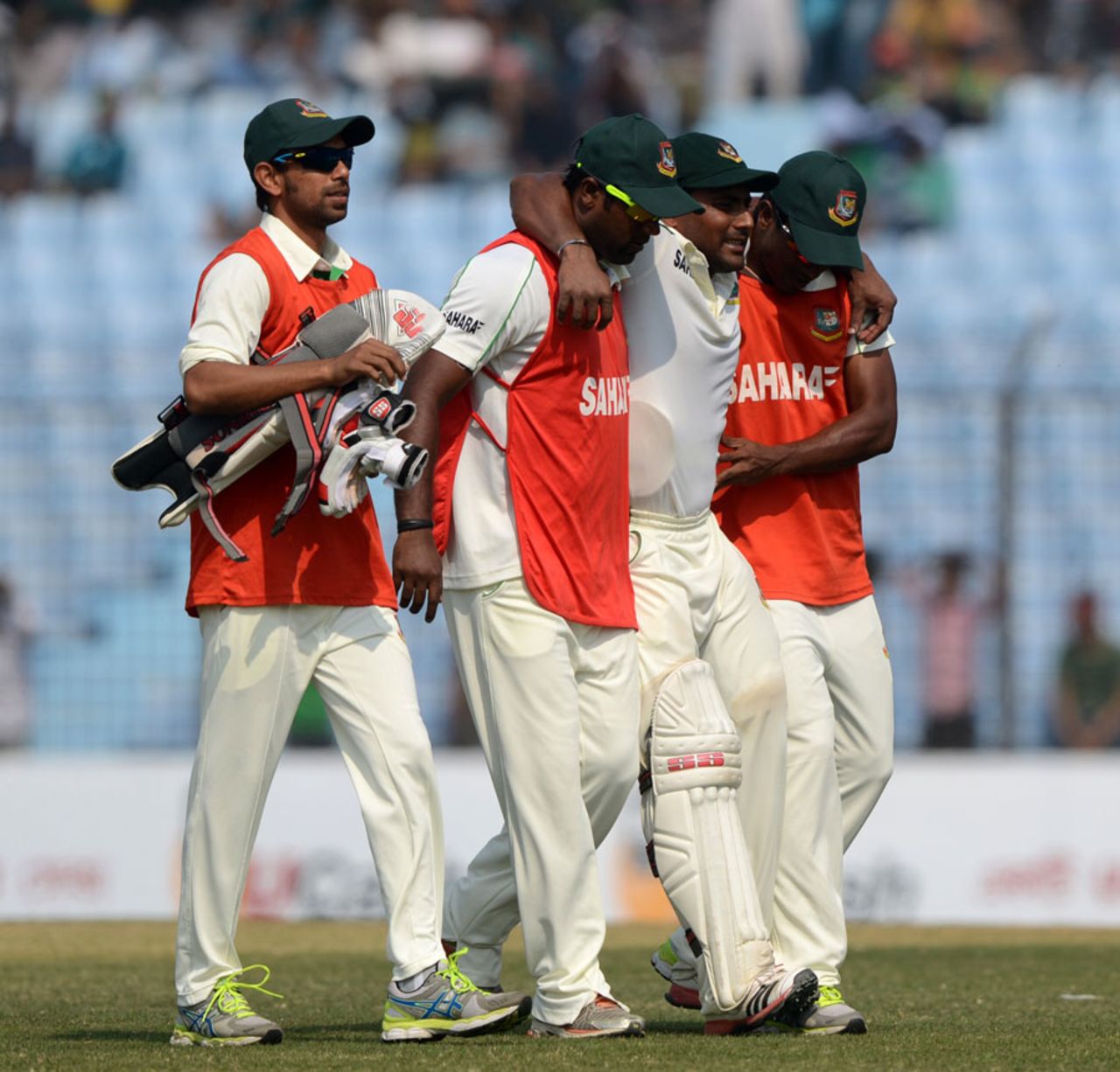 Imrul Kayes is helped off the field after pulling his hamstring, Bangladesh v Sri Lanka, 2nd Test, Chittagong, 3rd day, February 6, 2014