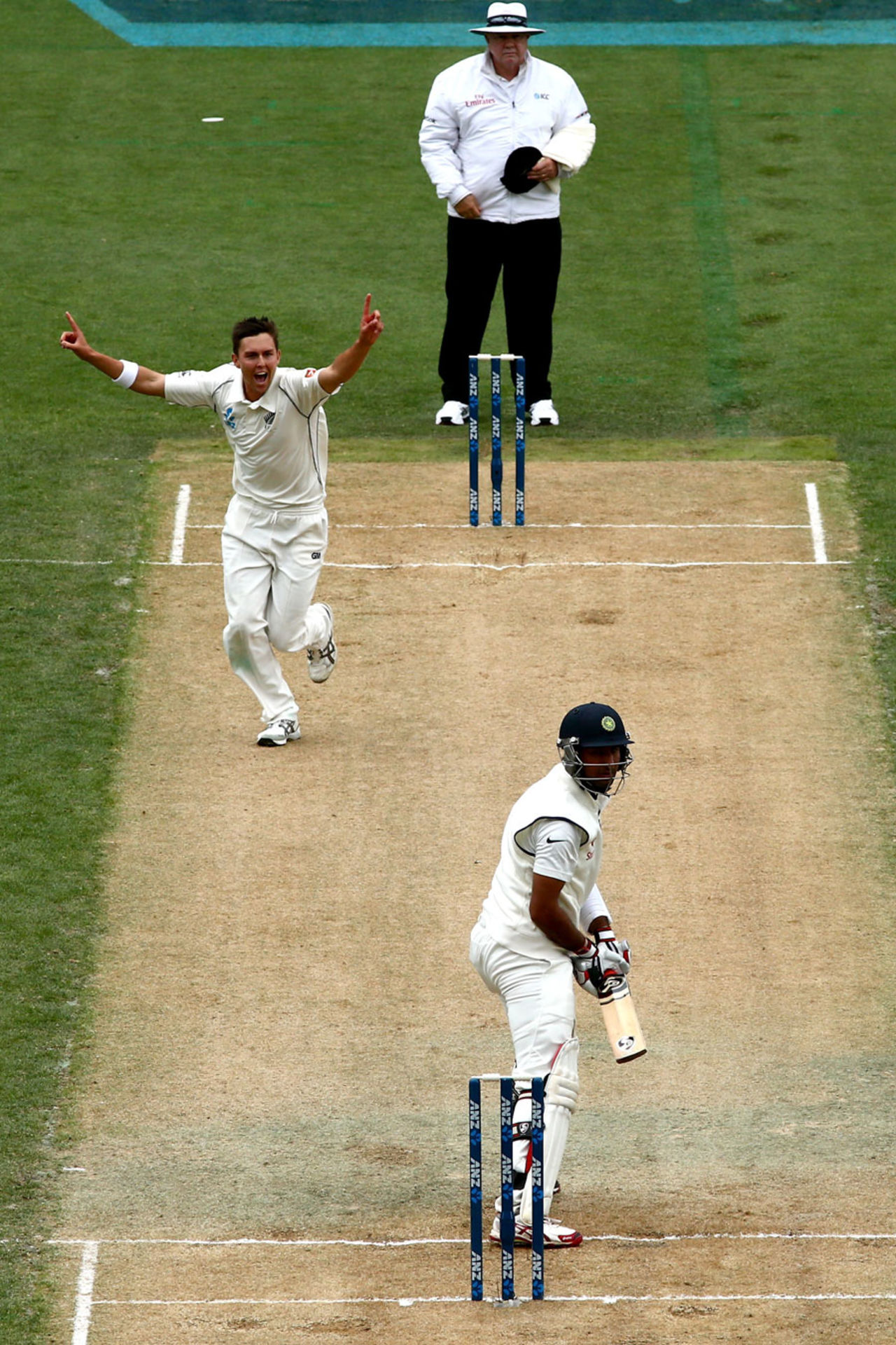 Trent Boult exults after dismissing Cheteshwar Pujara, New Zealand v India, 1st Test, Auckland, 2nd day, February 7, 2014