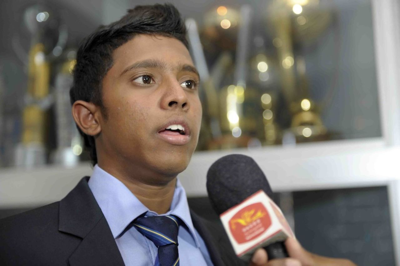 Sri Lanka Under-19 captain Kusal Mendis interacts with the media before the team's departure, Colombo, February 9, 2014