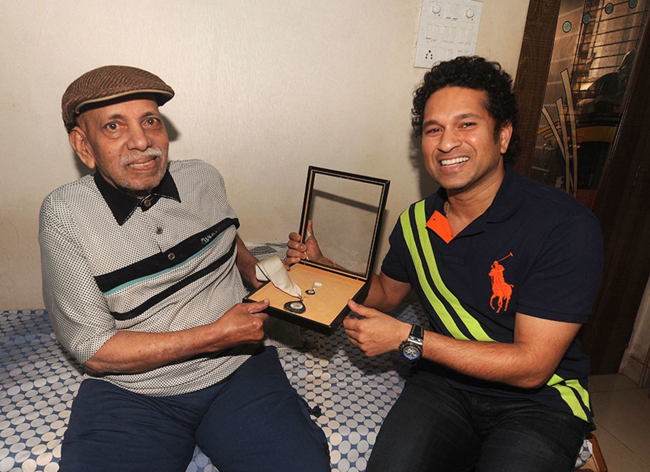 Sachin Tendulkar and his coach Ramakant Achrekar pose with the Bharat Ratna, Mumbai, February 10, 2014