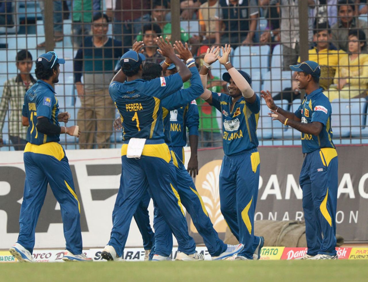Kusal Perera is congratulated after taking a stunning catch to remove Anamul Haque, Bangladesh v Sri Lanka, 2nd T20I, Chittagong, February 14, 2014