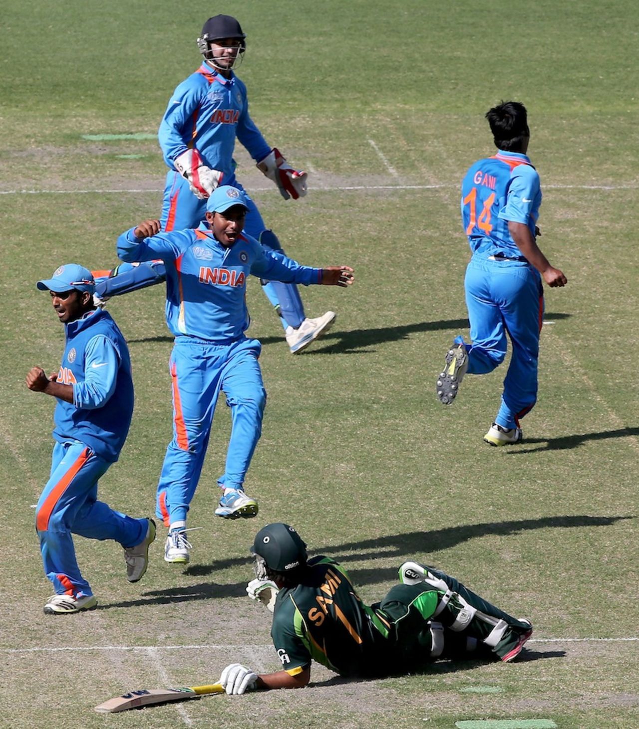 India players celebrate after running-out Sami Aslam, India v Pakistan, Under-19 World Cup, Group A, Dubai, February 15, 2014