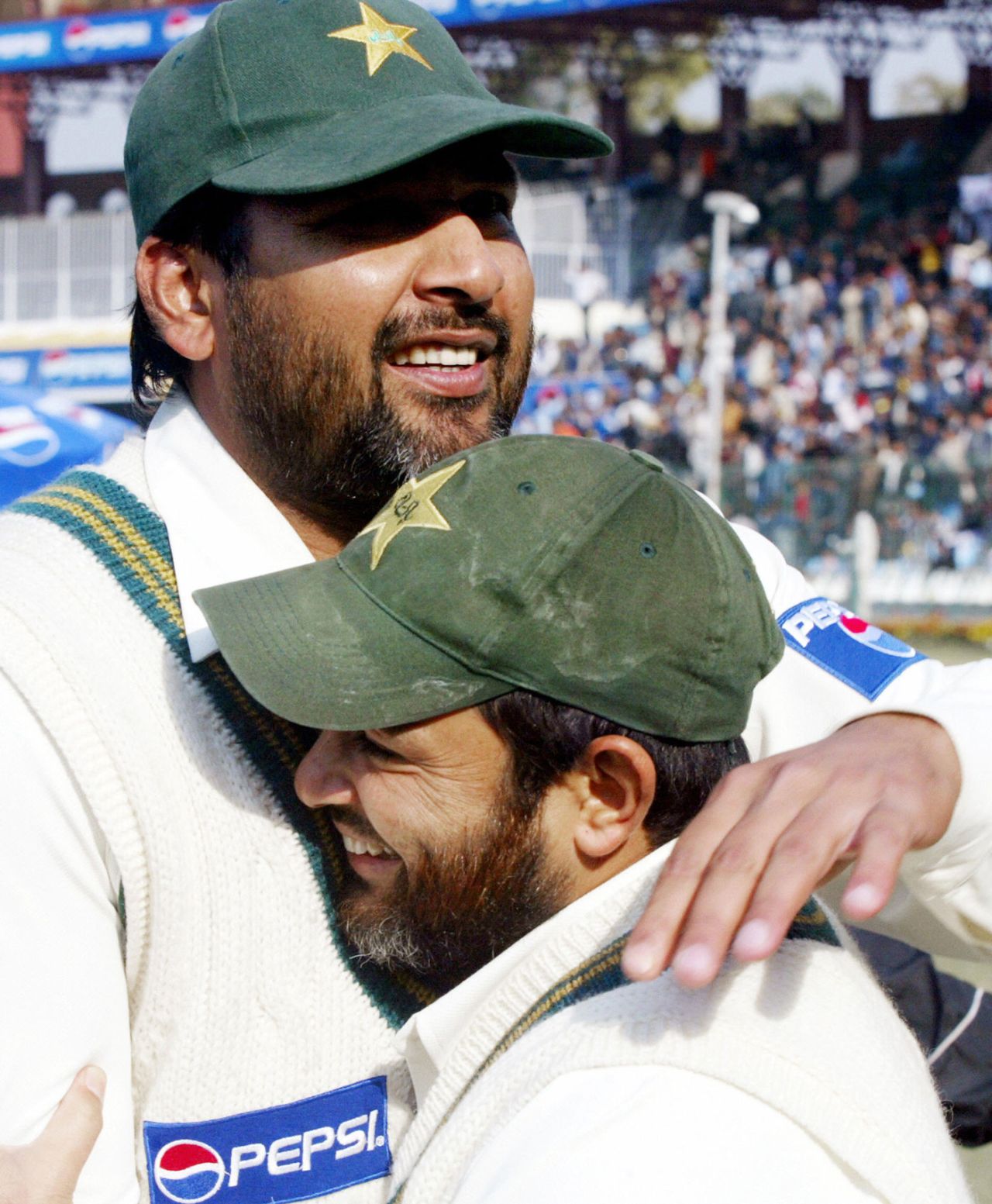 Inzamam-ul-Haq hugs his team-mate Mushtaq Ahmed after Pakistan's victory, Pakistan v England, 3rd Test, Lahore, 5th day, December 3, 2005