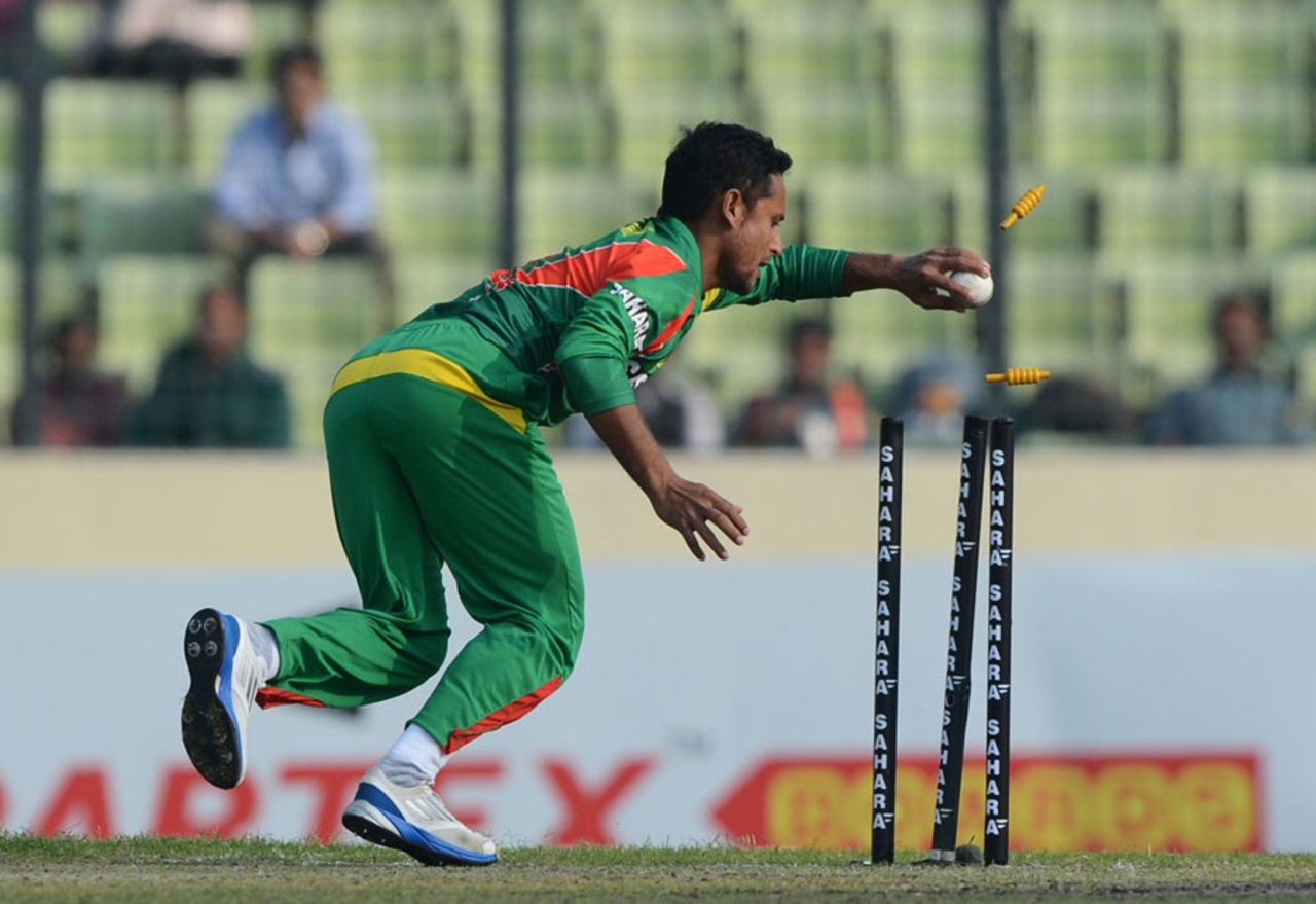 Arafat Sunny removes the stumps to effect the run-out of Dinesh Chandimal, Bangladesh v Sri Lanka, 1st ODI, Mirpur, February 17, 2014