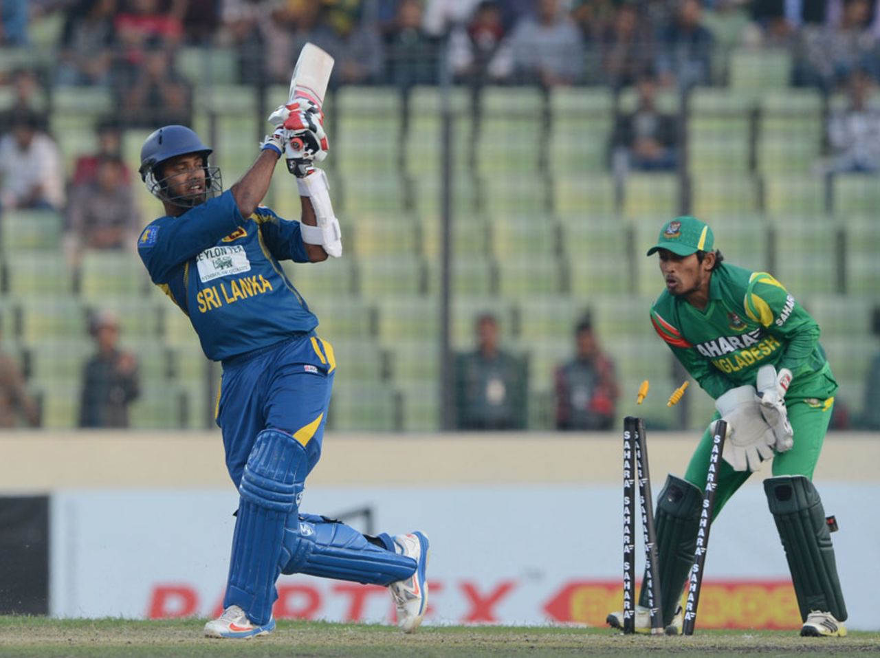 Sachithra Senanayake is bowled, Bangladesh v Sri Lanka, 1st ODI, Mirpur, February 17, 2014
