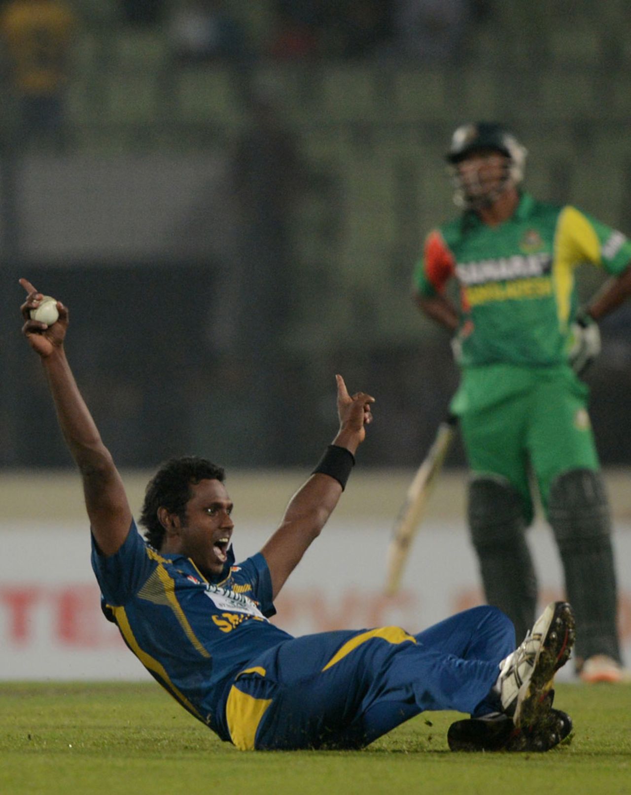 Angelo Mathews celebrates Sri Lanka's win, Bangladesh v Sri Lanka, 1st ODI, Mirpur, February 17, 2014