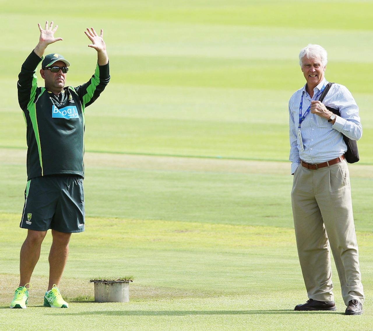 10 minutes to training: Darren Lehmann, with John Inverarity, signals to the team, Port Elizabeth, February 18, 2014