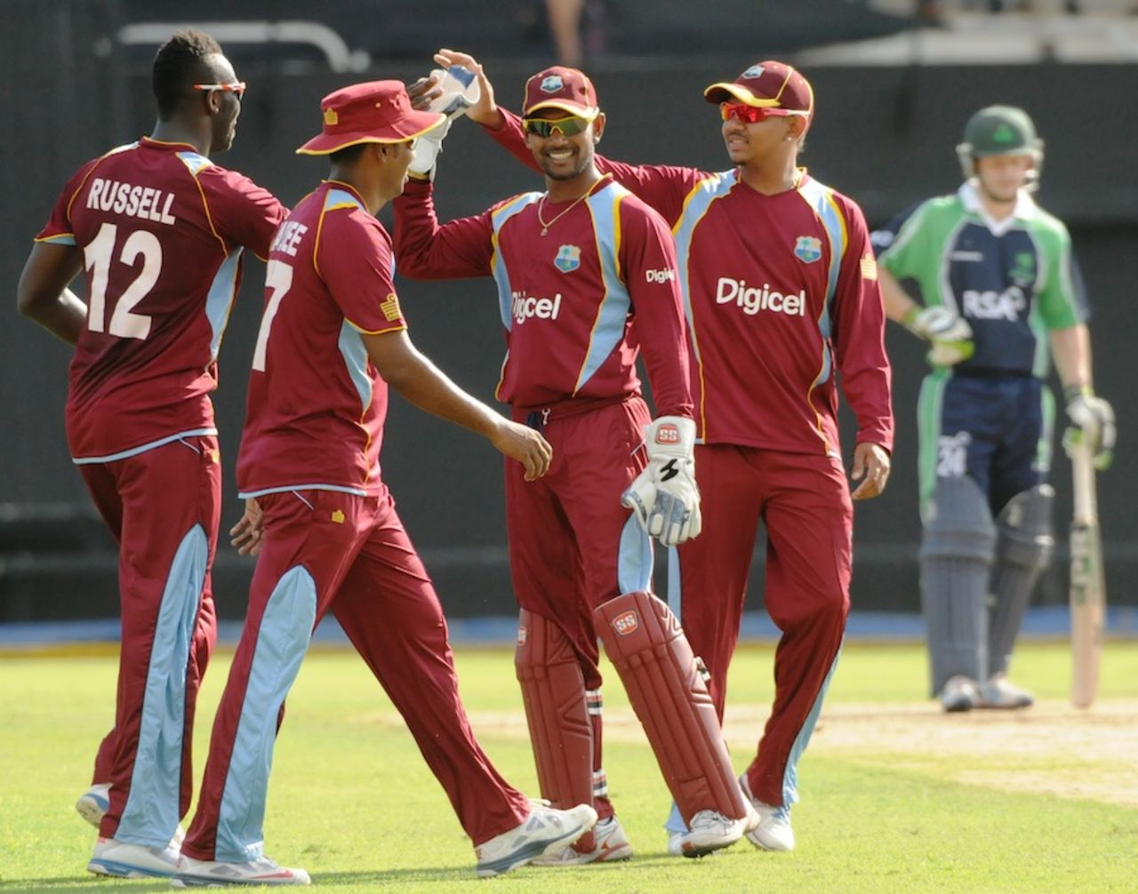 Denesh Ramdin celebrates a wicket with team-mates, West Indies v Ireland, 1st T20, Kingston, February 19, 2014