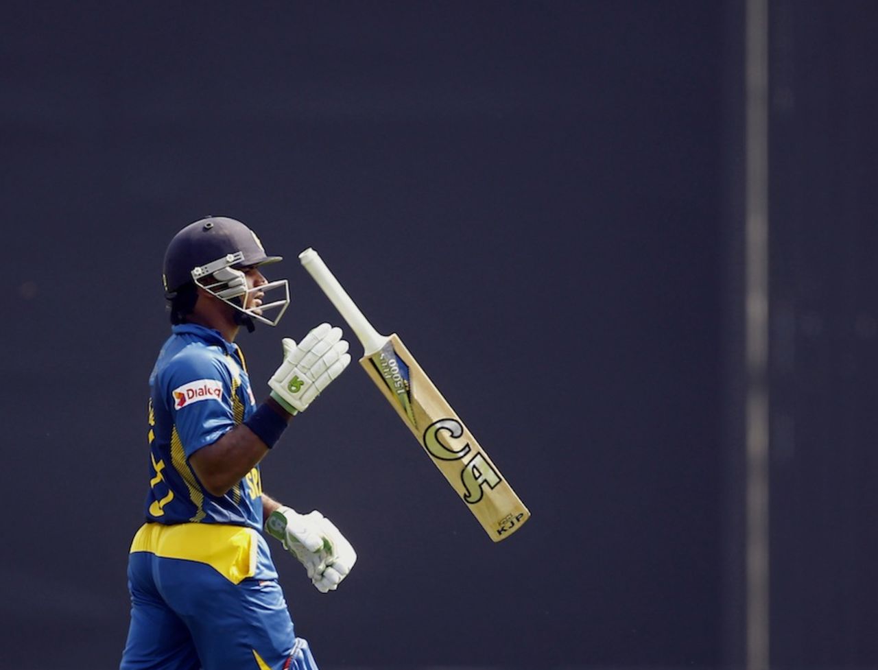 Kusal Perera walks back after falling for 8, Bangladesh v Sri Lanka, 2nd ODI, Mirpur, February 20, 2014