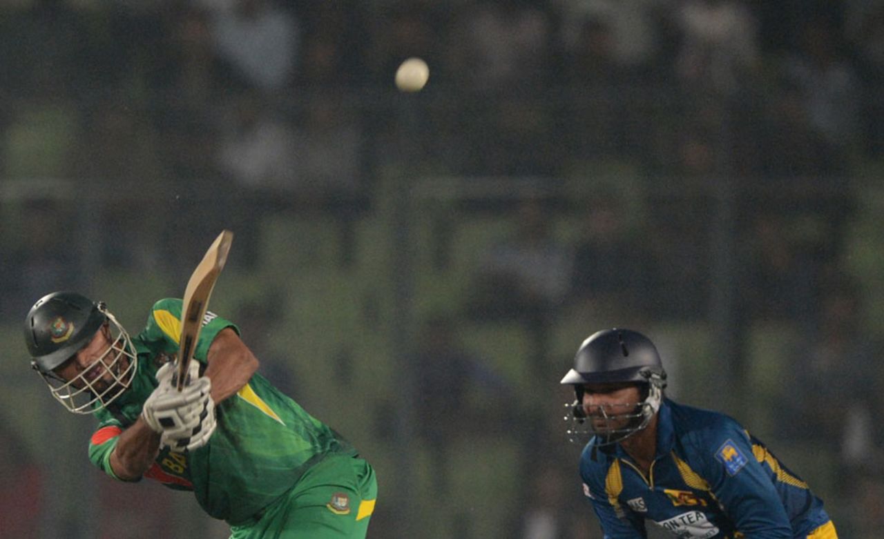 Mashrafe Mortaza plays a lofted shot, Bangladesh v Sri Lanka, 2nd ODI, Mirpur, February 20, 2014
