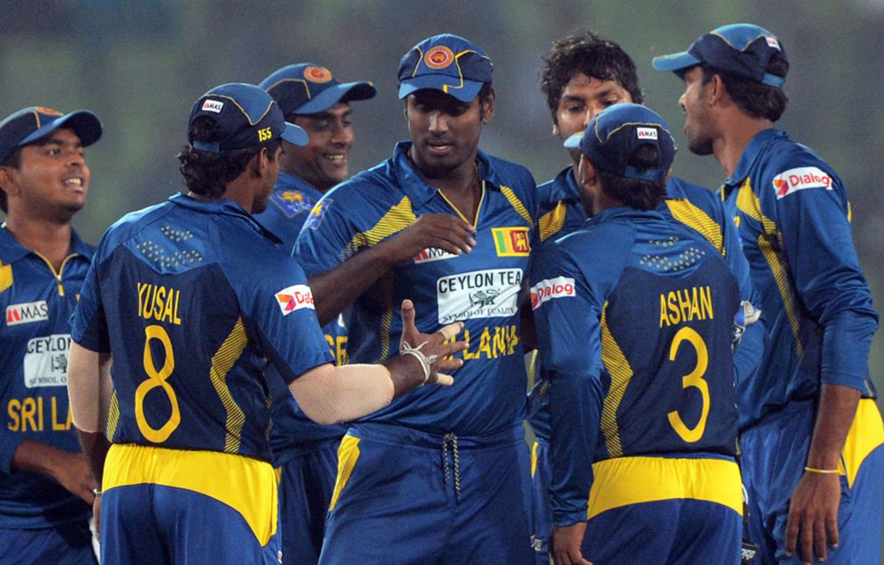 The Sri Lanka team celebrate their series win, Bangladesh v Sri Lanka, 2nd ODI, Mirpur, February 20, 2014