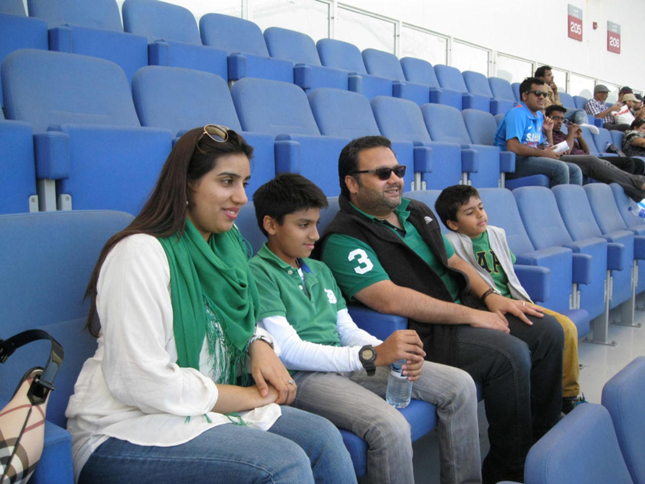 A Pakistani family watches a game at the Under-19 World Cup, Dubai Cricket Stadium, February 2014