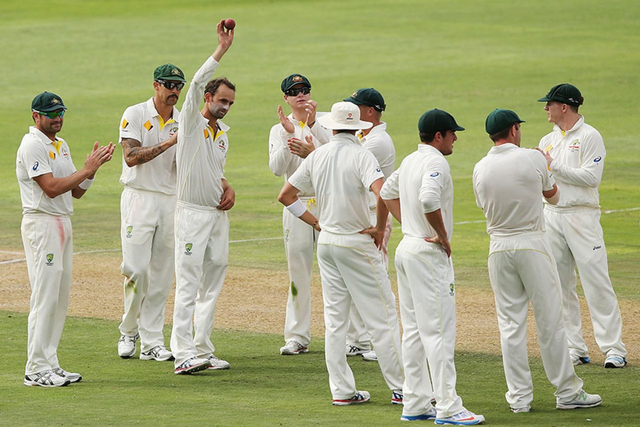 Nathan Lyon holds up the ball after picking up his fifth wicket, South Africa v Australia, 2nd Test, Port Elizabeth, 2nd day, February 21, 2014