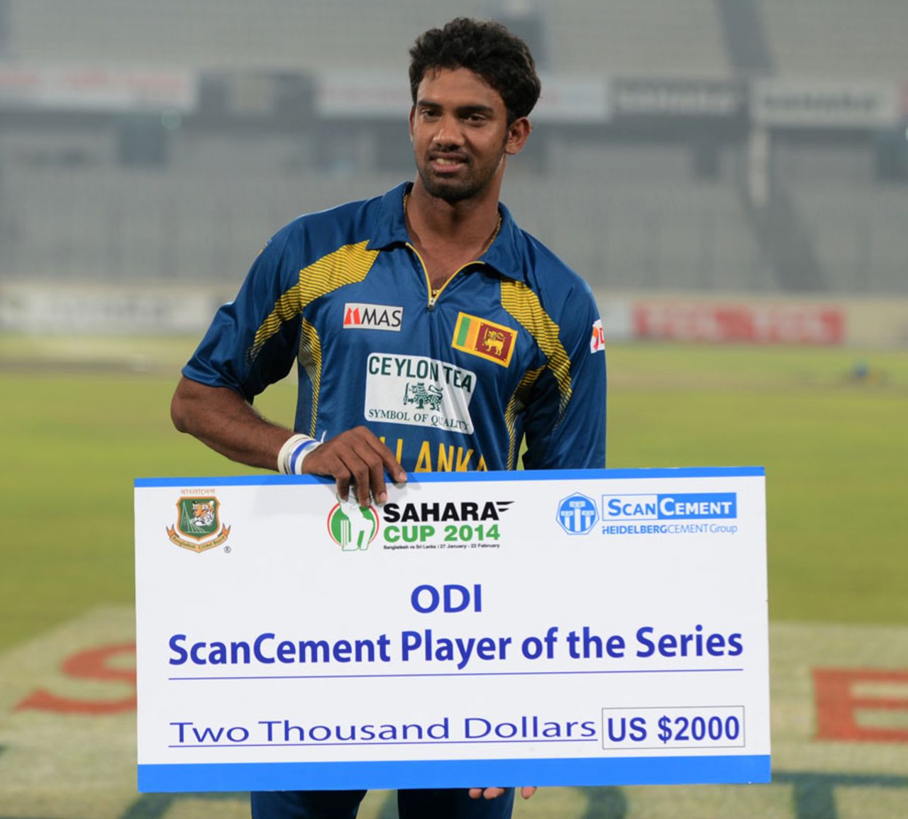 Sachithra Senanayake poses with the Player-of-the-Series award, Bangladesh v Sri Lanka, 3rd ODI, Dhaka, February 22, 2014