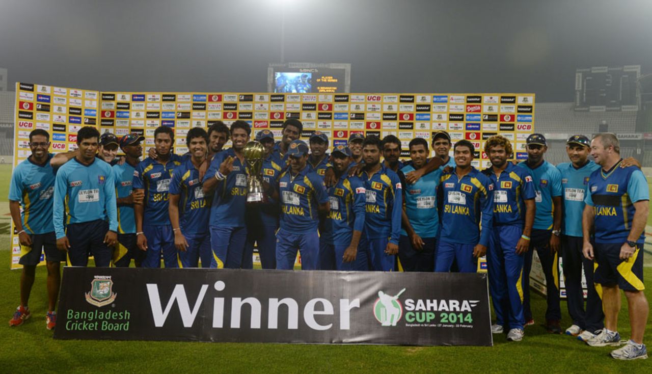 The Sri Lanka players celebrate after sweeping the series 3-0, Bangladesh v Sri Lanka, 3rd ODI, Dhaka, February 22, 2014