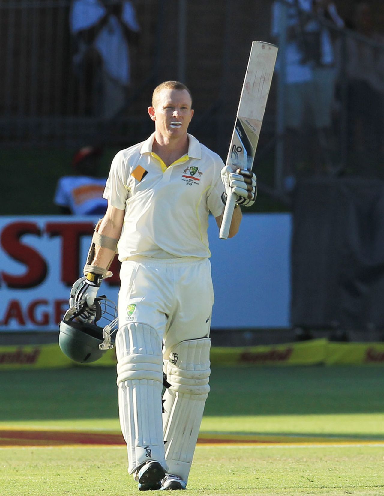 Chris Rogers raises the bat after reaching his hundred, South Africa v Australia, 2nd Test, Port Elizabeth, 4th day, February 23, 2014