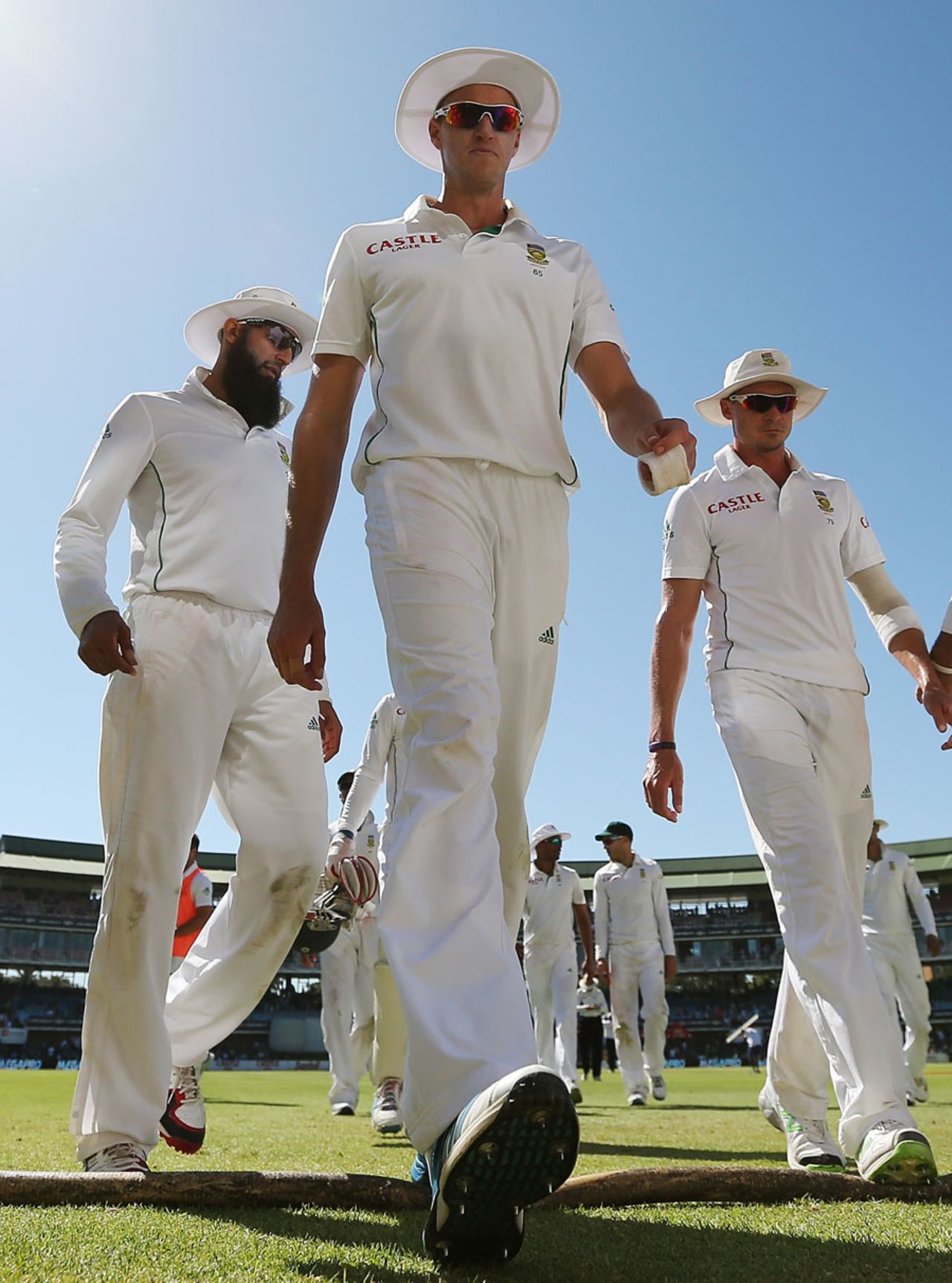 Morne Morkel, Dale Steyn and Hashim Amla walk back after South Africa's win, South Africa v Australia, 2nd Test, Port Elizabeth, 4th day, February 23, 2014