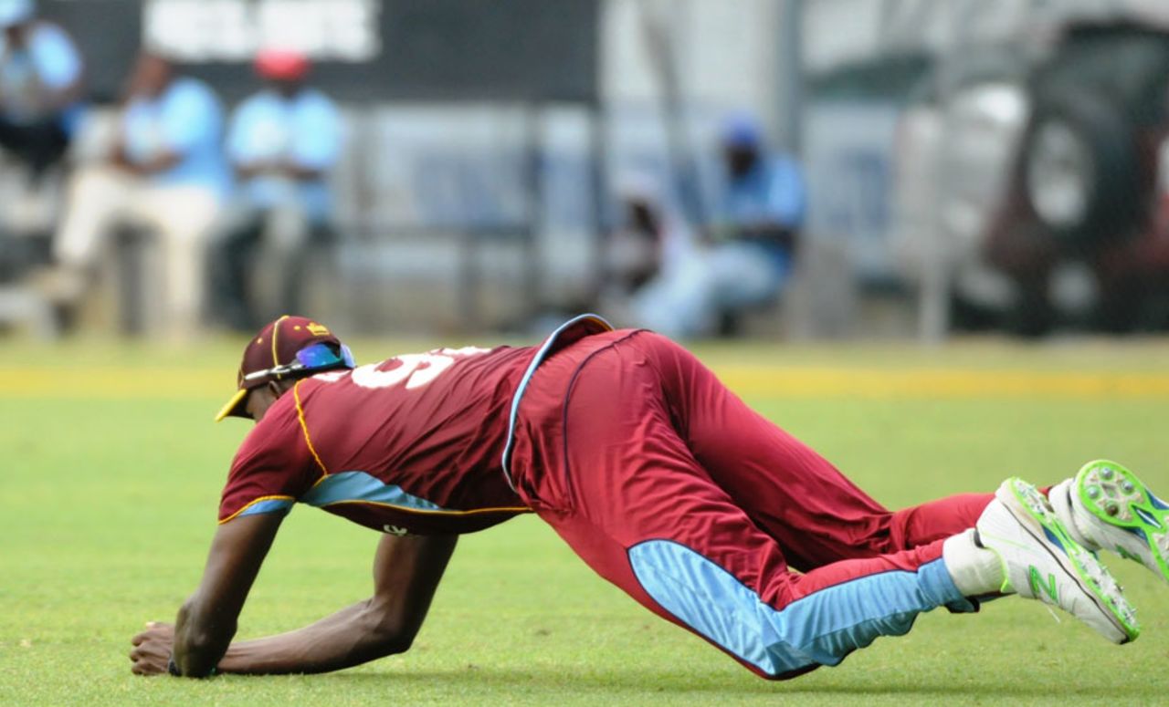 Jason Holder takes a diving catch, West Indies v Ireland, only ODI, Kingston, February 23, 2014